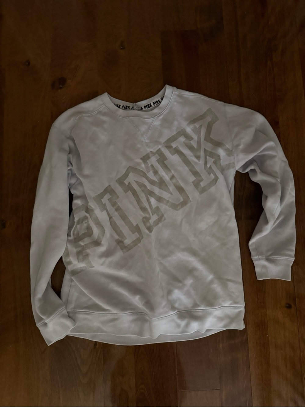 Women’s PINK Victoria’s Secret light blue sweatshirt size M neck has been adjust